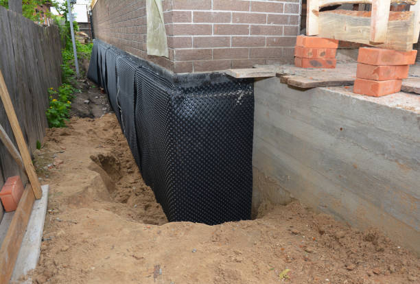 SJ Waterproofing Pros technician performing targeted Sump Pump Installation assessment in Vonore, TN